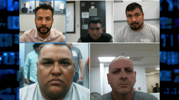 Five men in separate mugshot-style photos arranged in a grid, all looking at the camera with neutral expressions, indoor backgrounds visible behind them.