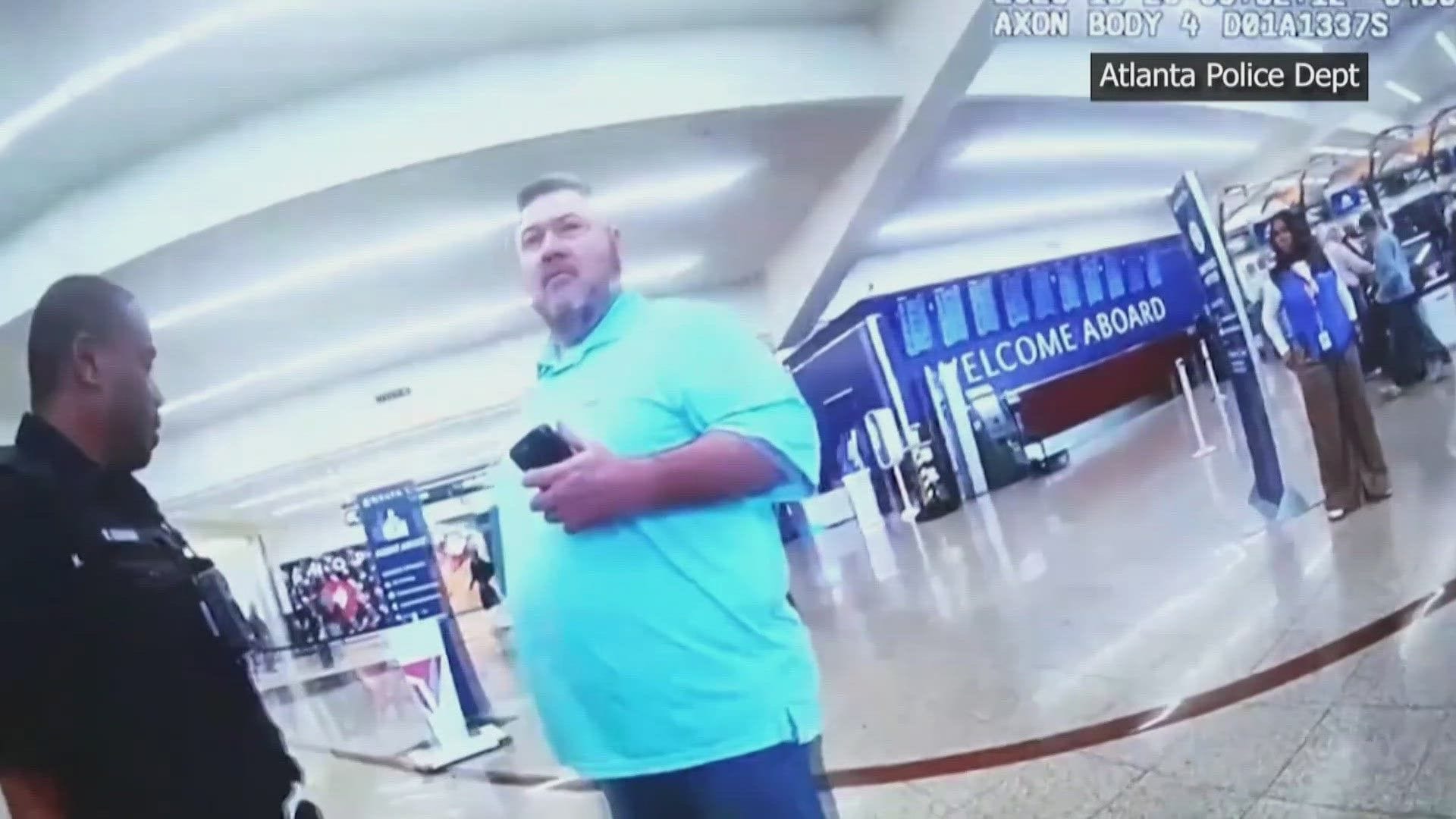 Two men, one in a police uniform and one in a light blue shirt, stand in an airport terminal near a "WELCOME ABOARD" sign. "Atlanta Police Dept" label is visible.